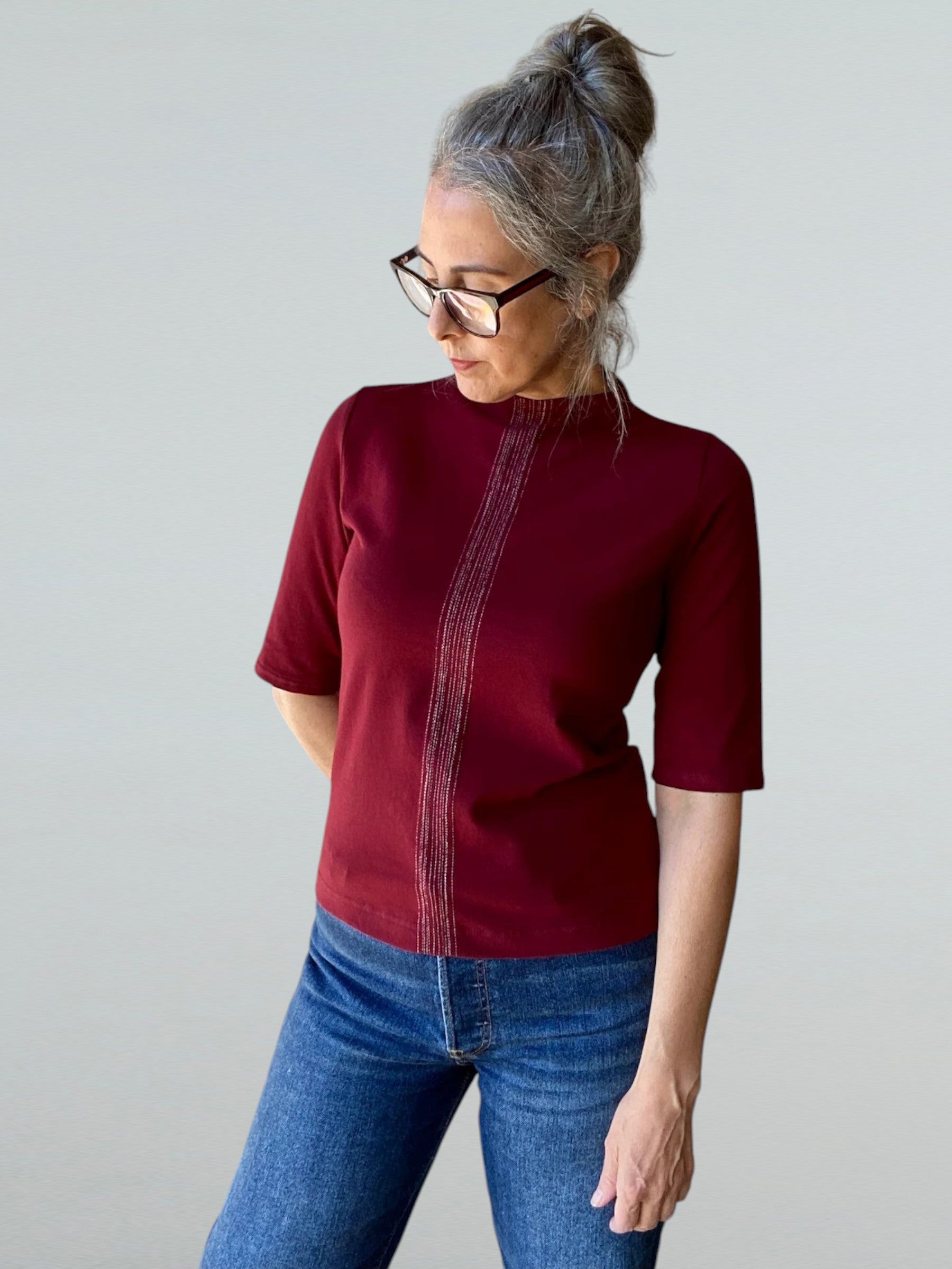 Funnel Neck Top in Wine with White Lines Center Front and Back.